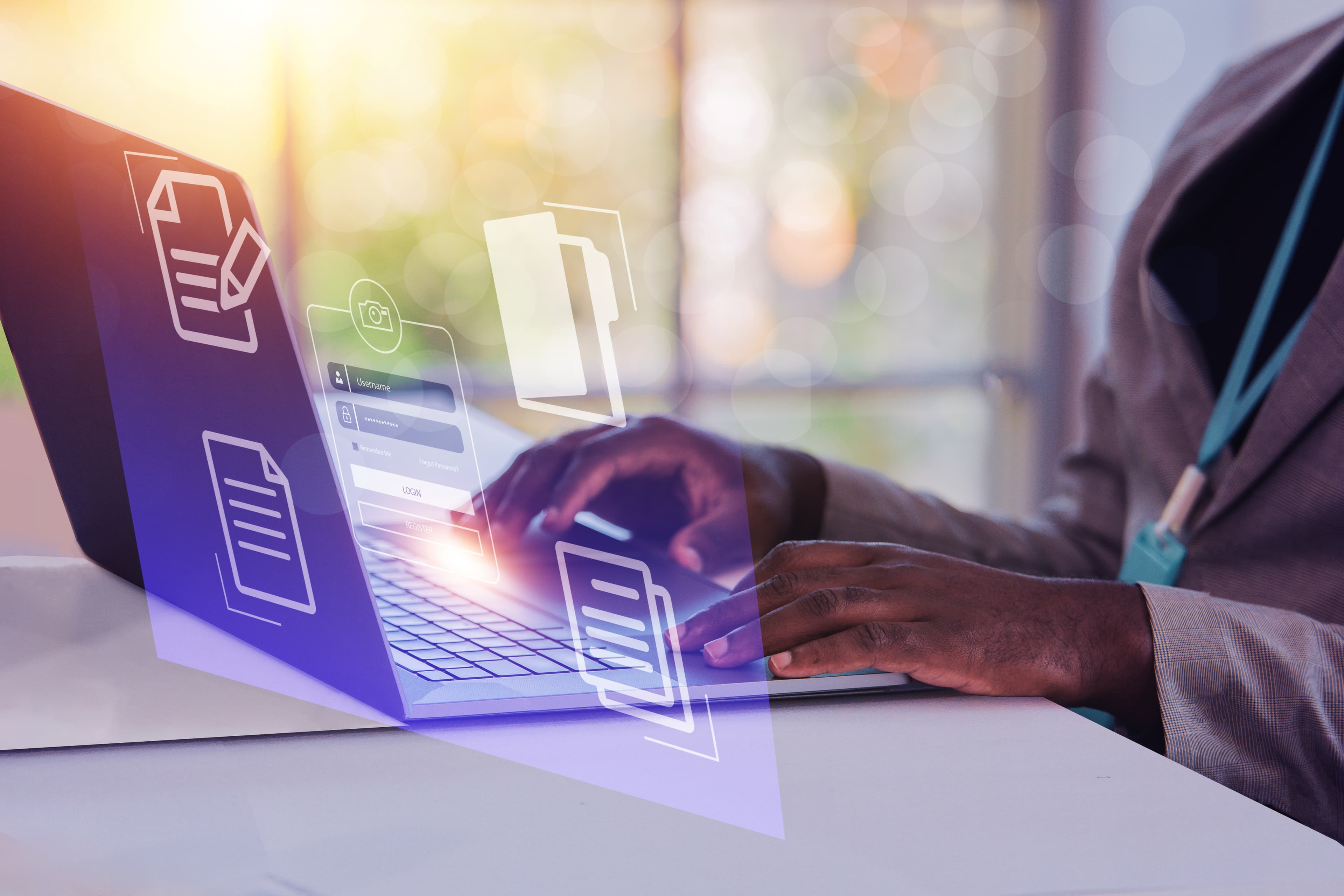 A person typing on a laptop.